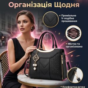 Жіноча сумка-саквояж з V-подібною прострочкою